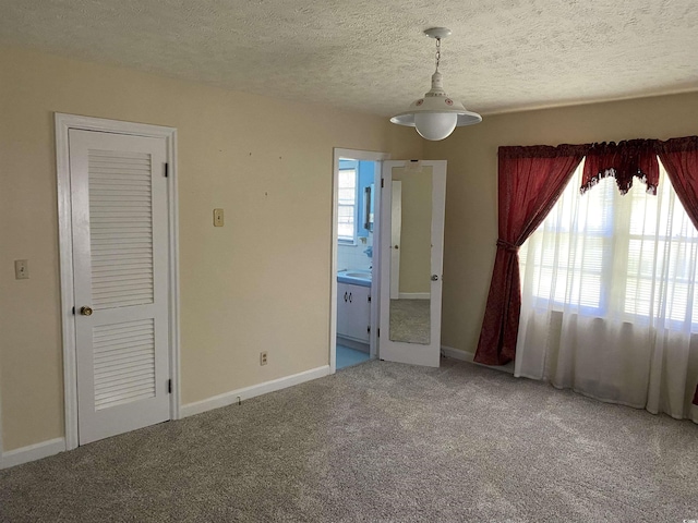 4155 Pinewood Dr, Mullins, SC 29574 - interior space featuring carpet floors and a textured ceiling
