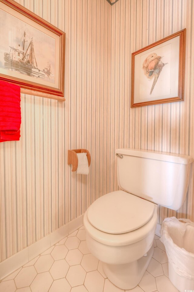 bathroom featuring tile patterned floors and toilet