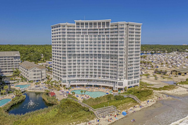 view of building exterior featuring a water view