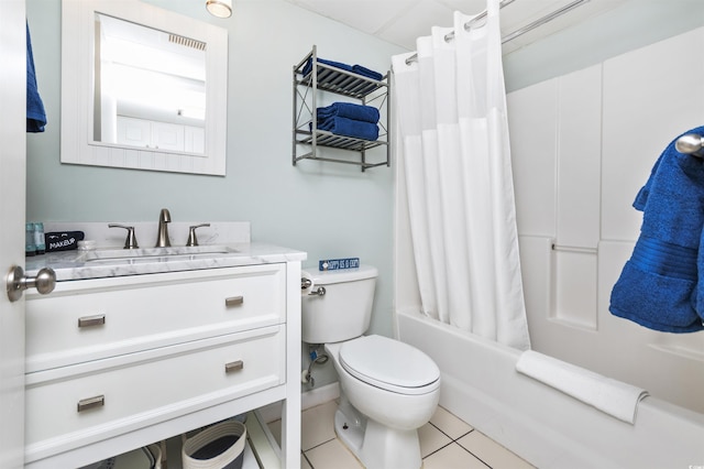 full bathroom featuring vanity, shower / tub combo with curtain, tile patterned floors, and toilet