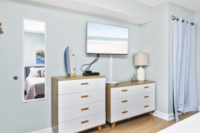 bedroom featuring light hardwood / wood-style floors