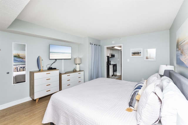 bedroom featuring light hardwood / wood-style floors