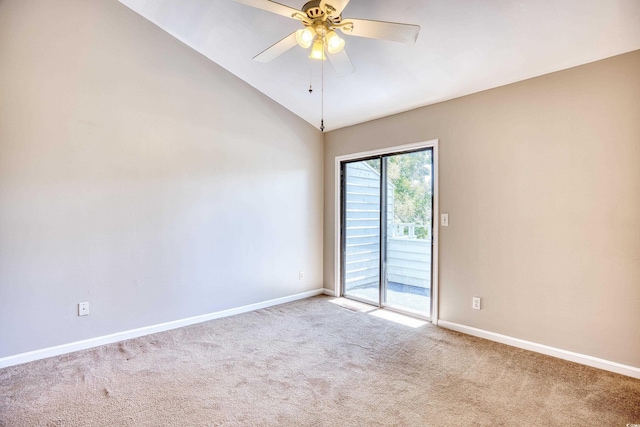 empty room featuring light colored carpet, ceiling fan, and lofted ceiling