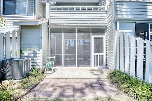 doorway to property featuring cooling unit