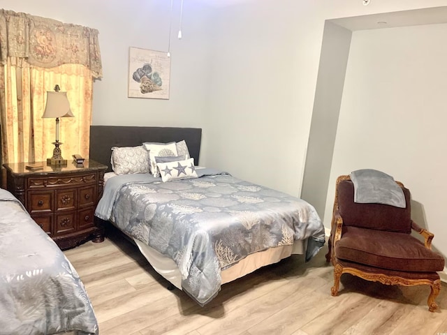 bedroom with light hardwood / wood-style flooring