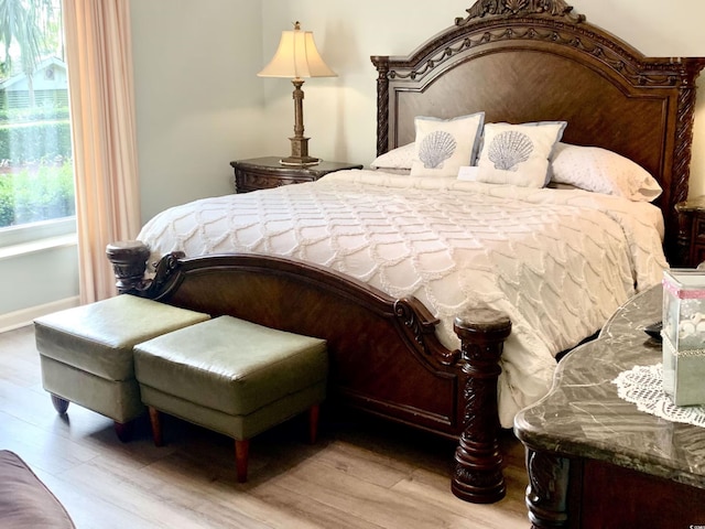 bedroom featuring light hardwood / wood-style floors