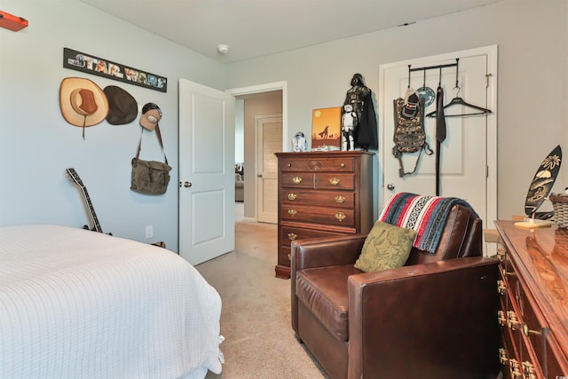 bedroom with light colored carpet