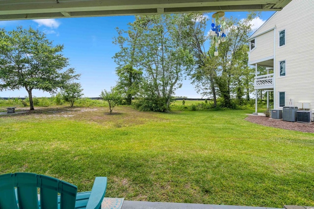 view of yard featuring central AC unit