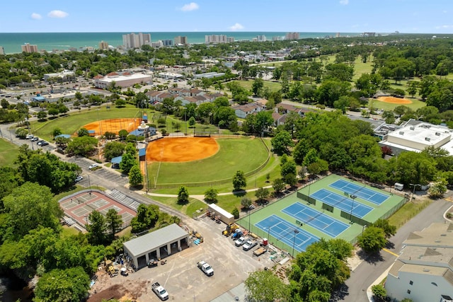 birds eye view of property with a water view