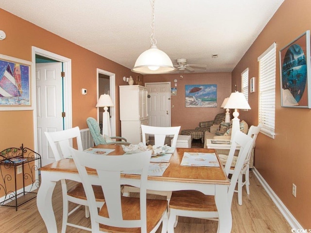 1505 Hillside Dr Unit 2, North Myrtle Beach, SC 29582 - dining area featuring light wood finished floors and ceiling fan