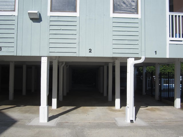 1505 Hillside Dr Unit 2, North Myrtle Beach, SC 29582 - view of vehicle parking featuring a carport