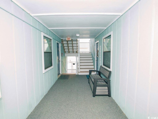 corridor with carpet floors