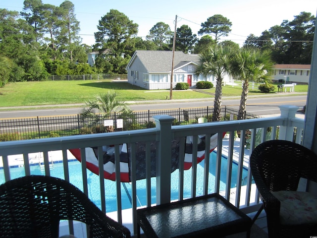 1505 Hillside Dr Unit 2, North Myrtle Beach, SC 29582 - balcony featuring view of pool area