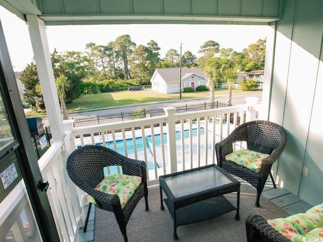 1505 Hillside Dr Unit 2, North Myrtle Beach, SC 29582 - balcony featuring view of pool area