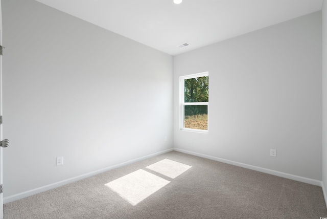 view of carpeted spare room