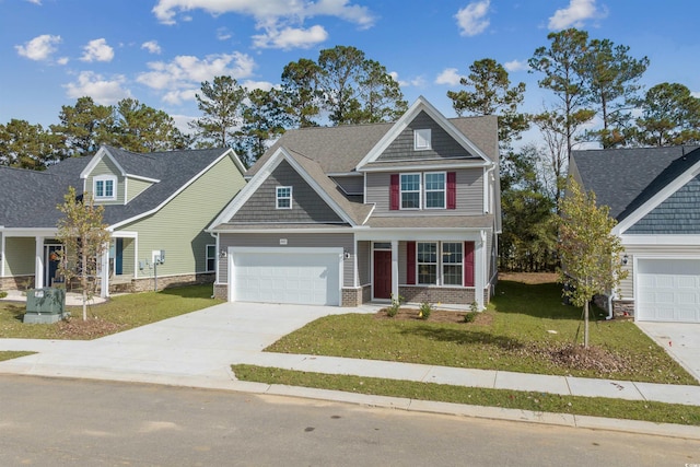 craftsman inspired home with a front lawn and a garage