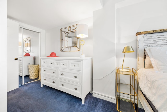 carpeted bedroom featuring a closet