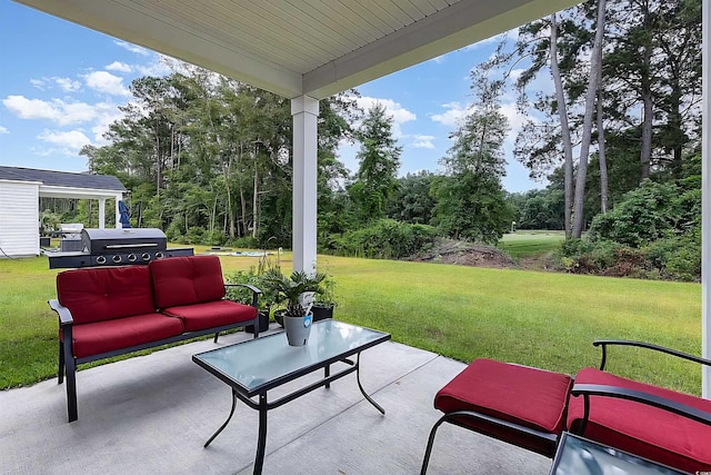 view of patio / terrace with a grill and outdoor lounge area