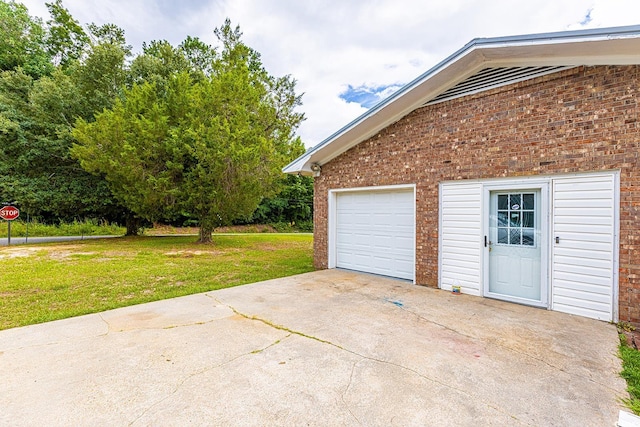 garage featuring driveway