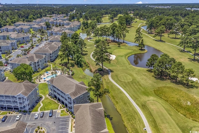 aerial view featuring view of golf course, a water view, and a residential view