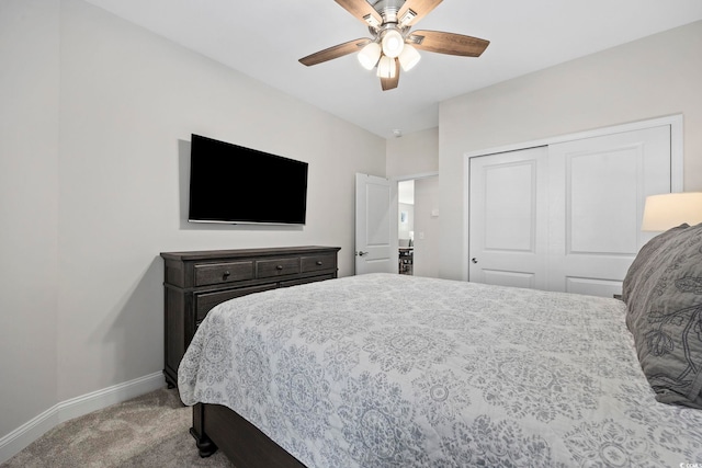 bedroom featuring a closet, carpet flooring, and ceiling fan