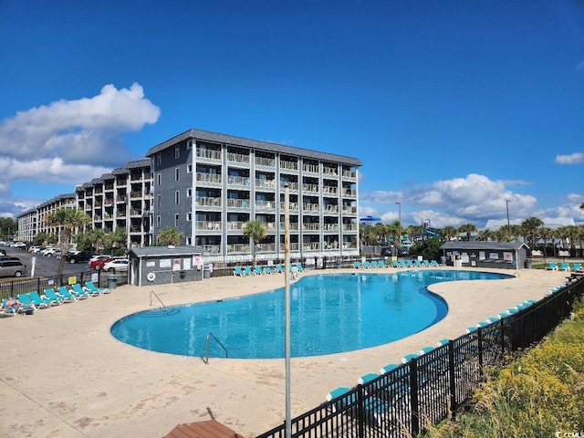 view of pool featuring a patio area