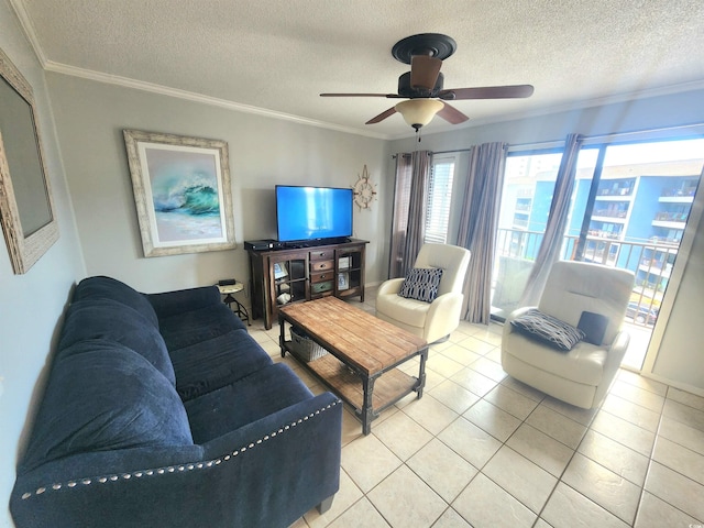 living room with crown molding, light tile patterned floors, a textured ceiling, and ceiling fan