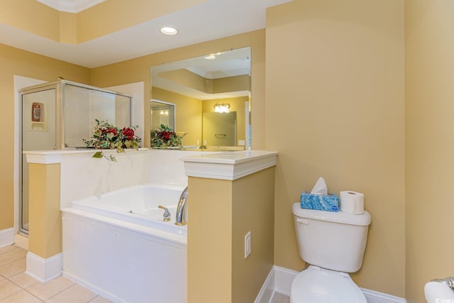 bathroom featuring tile patterned floors, toilet, ornamental molding, and shower with separate bathtub