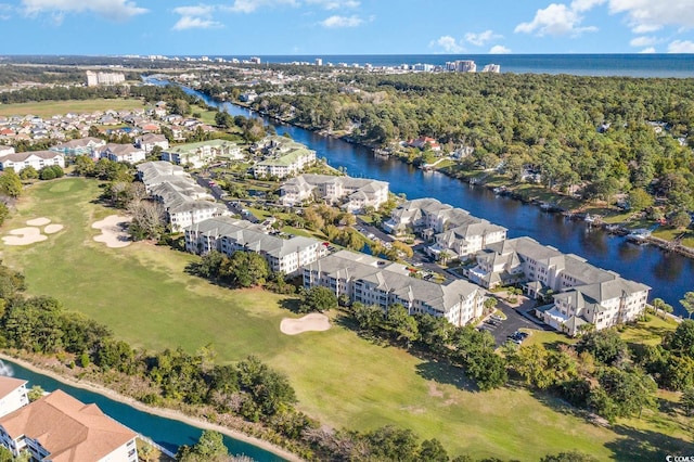 bird's eye view with a water view