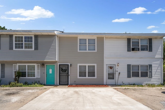 view of property featuring a patio