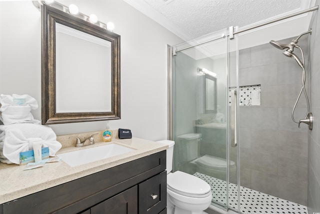 bathroom featuring crown molding, a textured ceiling, a shower with shower door, vanity, and toilet