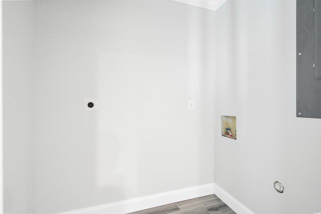 clothes washing area featuring wood-type flooring, washer hookup, and hookup for an electric dryer