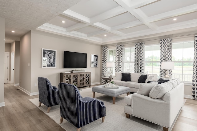 living room with a textured ceiling, beam ceiling, light hardwood / wood-style floors, and coffered ceiling