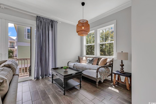 living room with ornamental molding and hardwood / wood-style floors