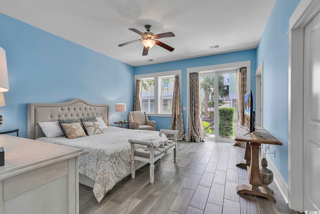 bedroom featuring hardwood / wood-style floors and ceiling fan