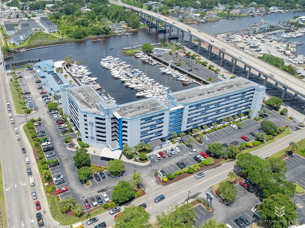 birds eye view of property featuring a water view