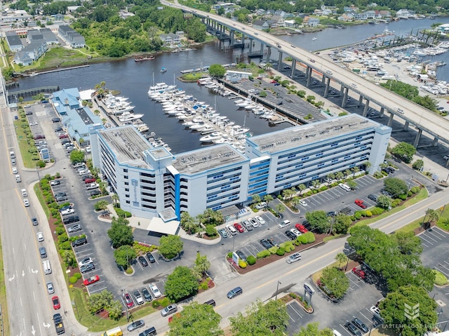 birds eye view of property featuring a water view