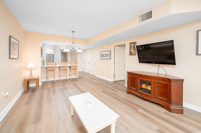 unfurnished living room featuring light hardwood / wood-style flooring