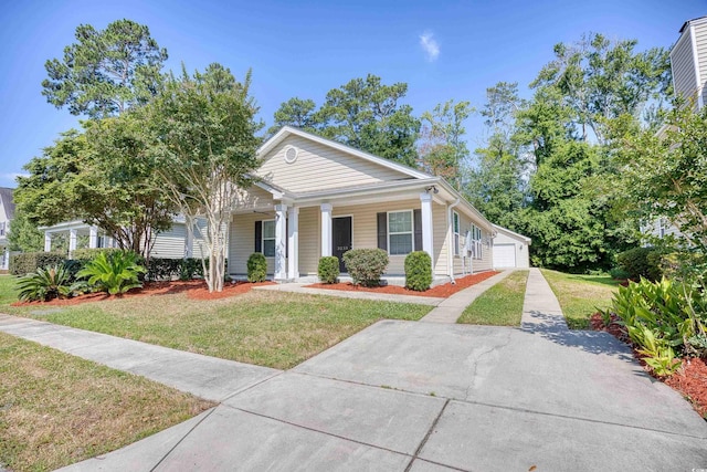 view of front of home with covered porch and a front yard