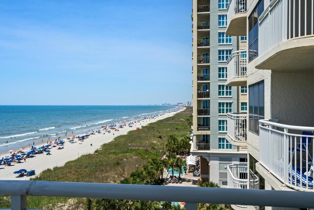 property view of water featuring a beach view