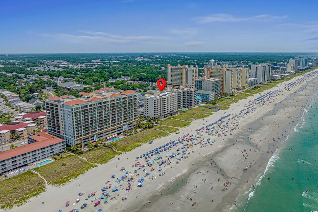 bird's eye view featuring a beach view and a water view