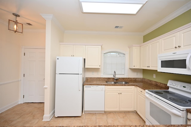 kitchen featuring white cabinetry, sink, light tile patterned floors, crown molding, and white appliances