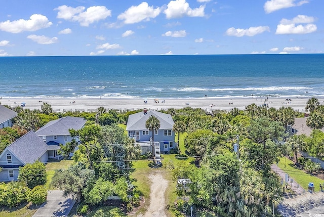 aerial view featuring a water view and a view of the beach