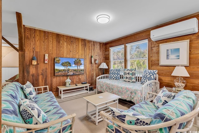 bedroom with carpet flooring, wooden walls, and a wall mounted air conditioner