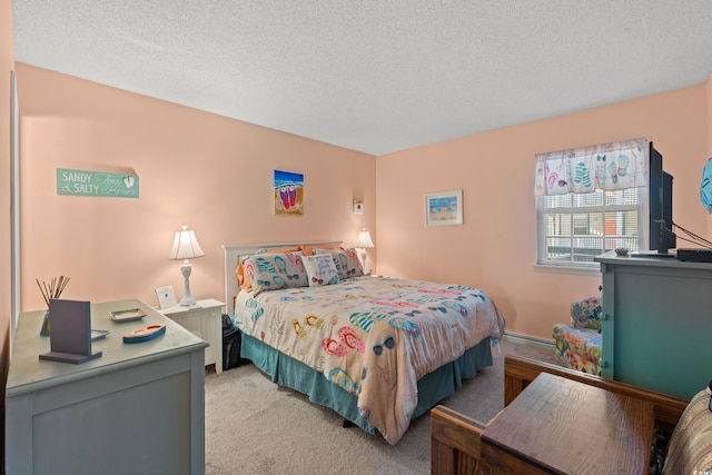 carpeted bedroom with a textured ceiling