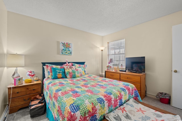 carpeted bedroom with a textured ceiling