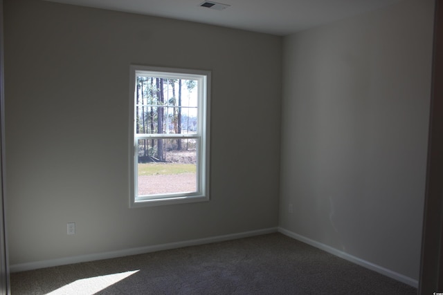 view of carpeted spare room