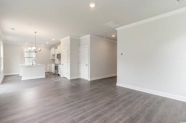 unfurnished living room with a chandelier, crown molding, baseboards, and dark wood-style flooring