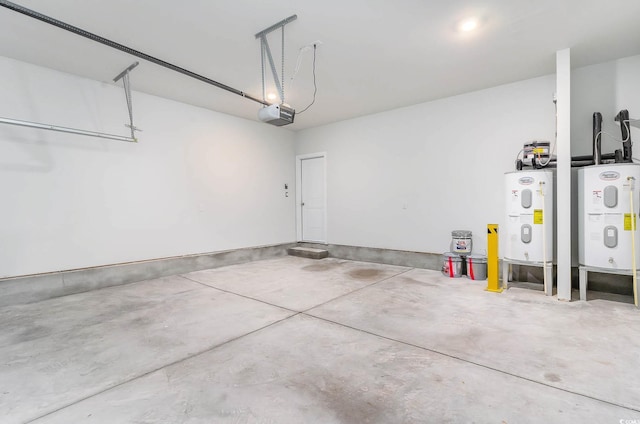 garage featuring electric water heater and a garage door opener