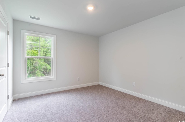 view of carpeted spare room